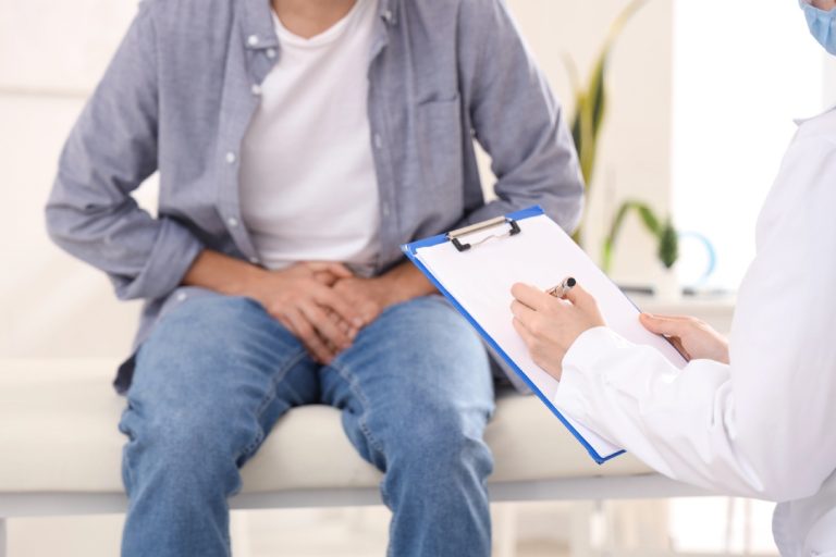 Patient showing symptoms during exam—affordable and discreet care available through cheap STI testing Houston providers.