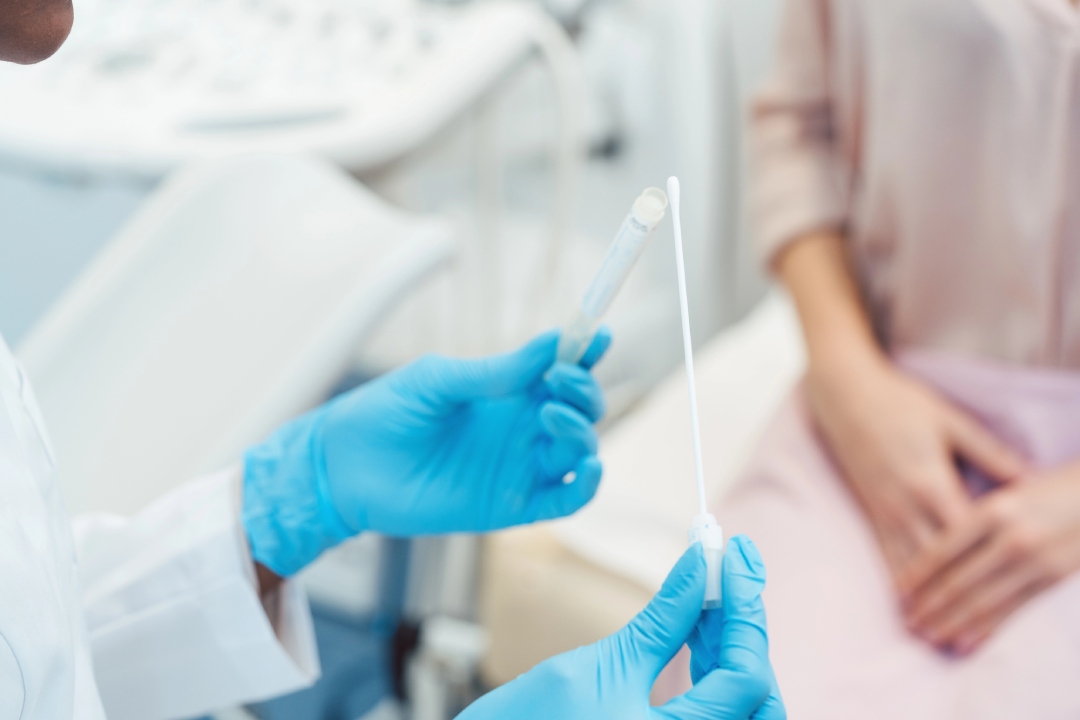 Healthcare provider prepares swab test—confidential sample collection at trusted STD Clinic for fast, reliable results.