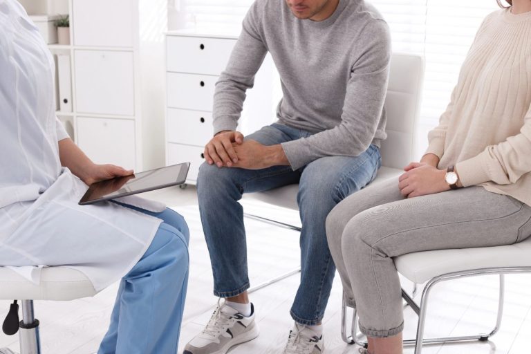 Patient consulting a doctor during urgent STD lab testing in Houston