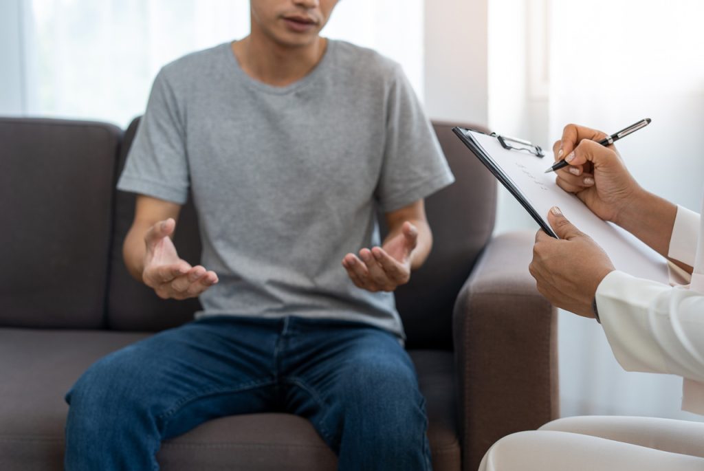 Healthcare provider offering patient counseling during a cheap STI testing Houston appointment at a local clinic.