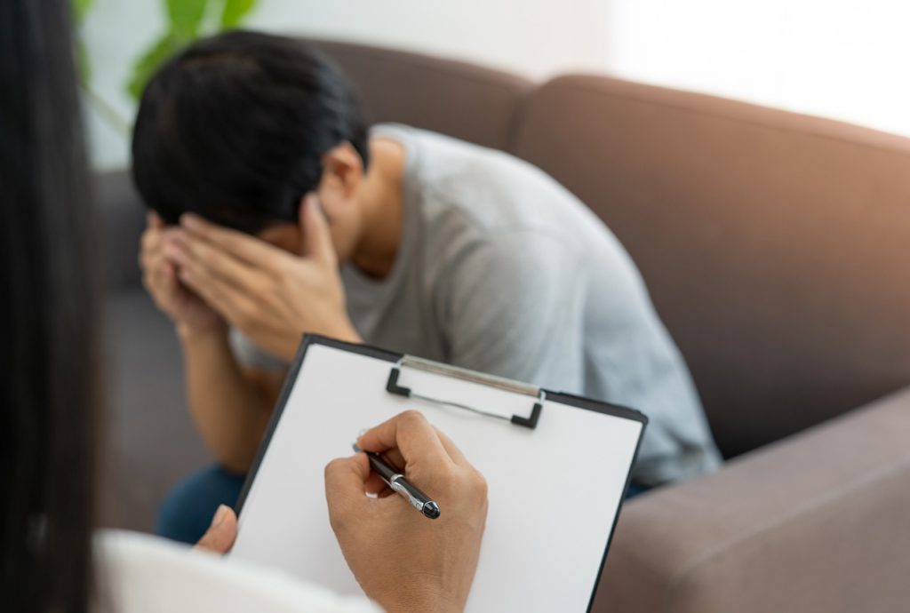 A patient discusses results with a counselor during a same day STI test Houston appointment to manage stress and health.
