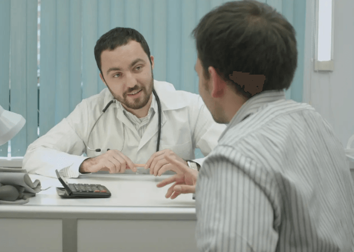 A physician provides confidential patient care and consultation for std testing houston at a local health clinic.