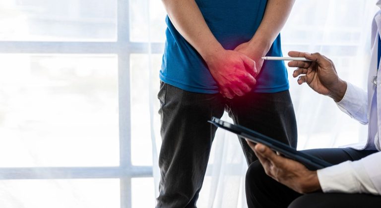 A doctor evaluates symptoms for gay men gonorrhea testing Houston while consulting with a patient in a bright office.